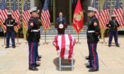 Ambassador Garcetti with a few marines at the front of U.S. Embassy New Delhi